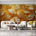 Golden leaves wallpaper adding warmth to a modern living room, metallic accents catching afternoon light