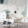 Graffiti wallpaper in modern living room showing vibrant street art design with turquoise and pink tones