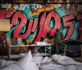 Graffiti wallpaper creating bold impact in modern teen bedroom with gaming setup