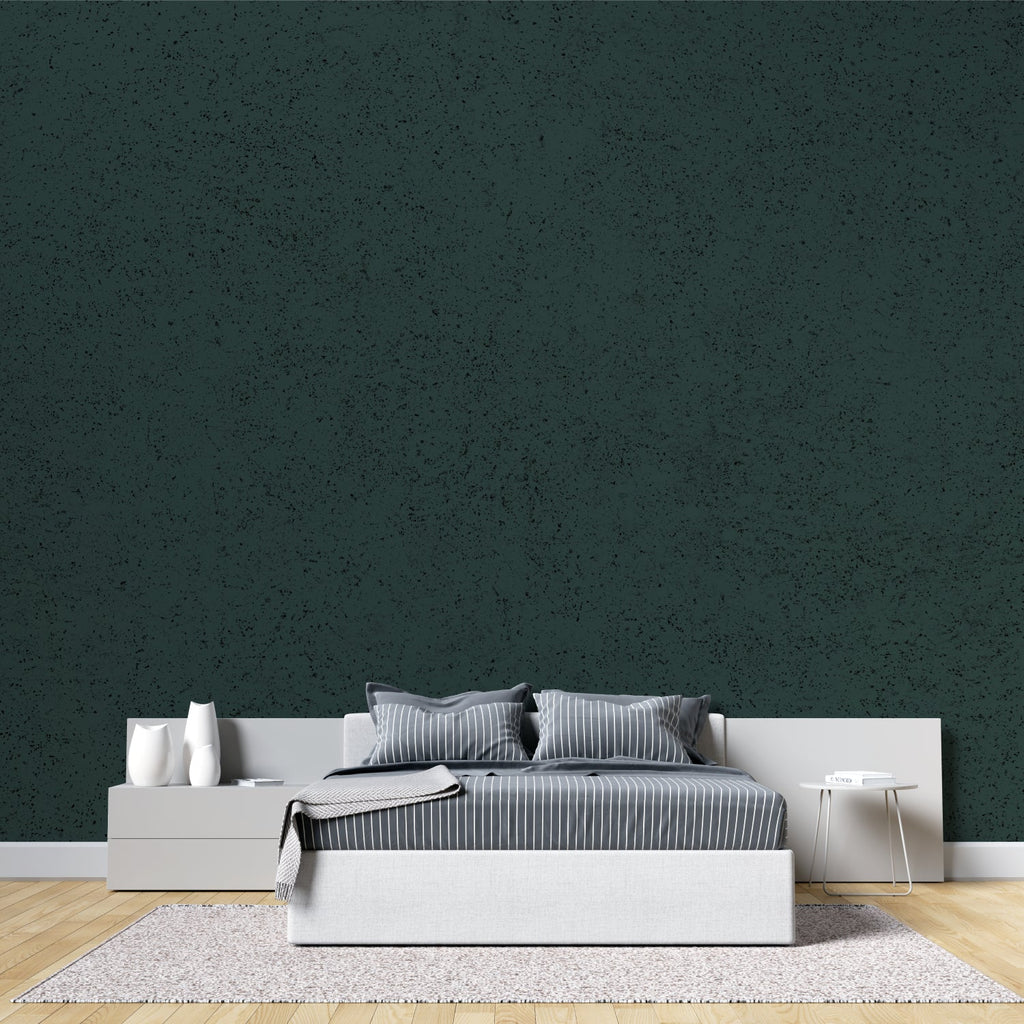 Green velvet wall covering in boutique hotel lobby setting