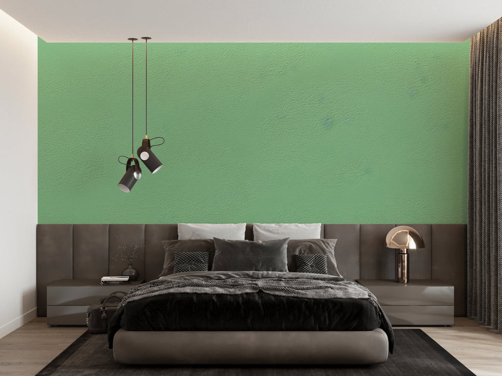 Modern green mural wallpaper in minimalist living room with natural light streaming through large windows