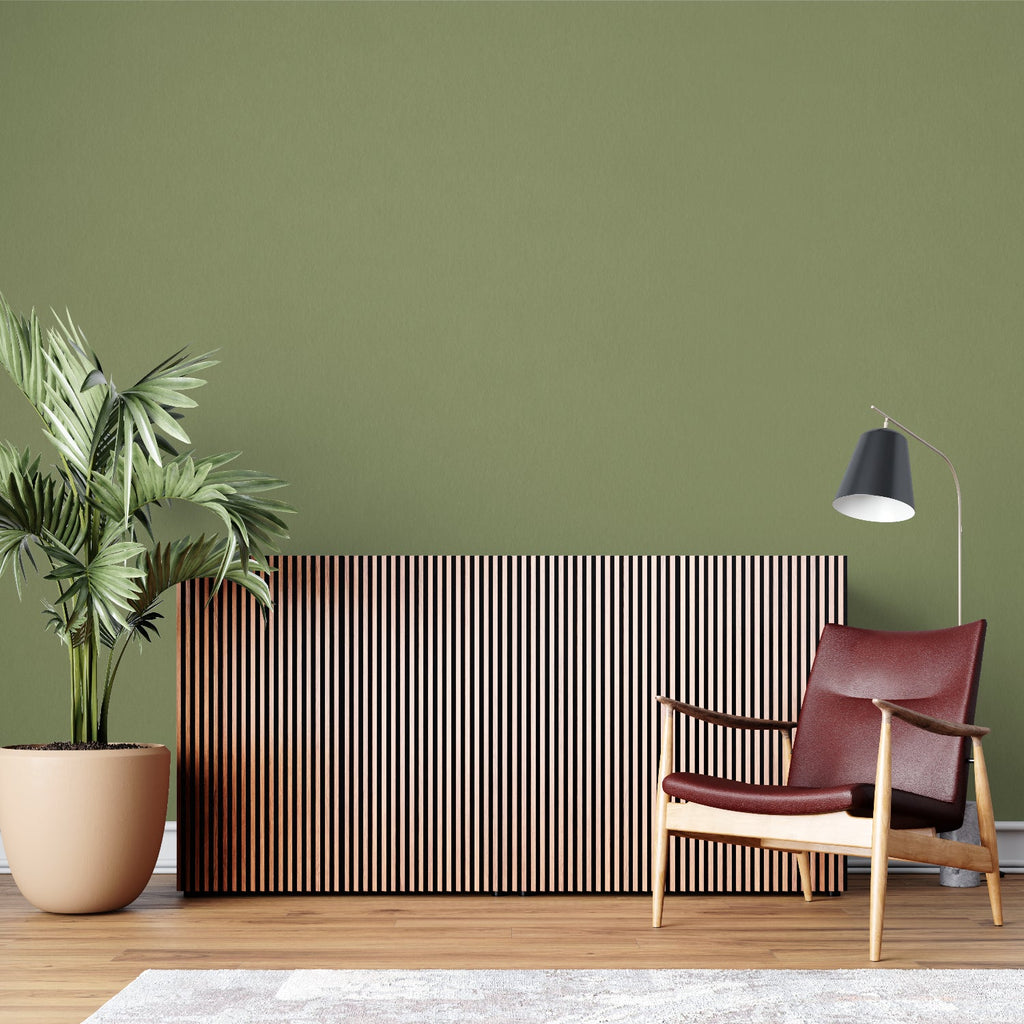 Green solid color wallpaper in contemporary dining room space