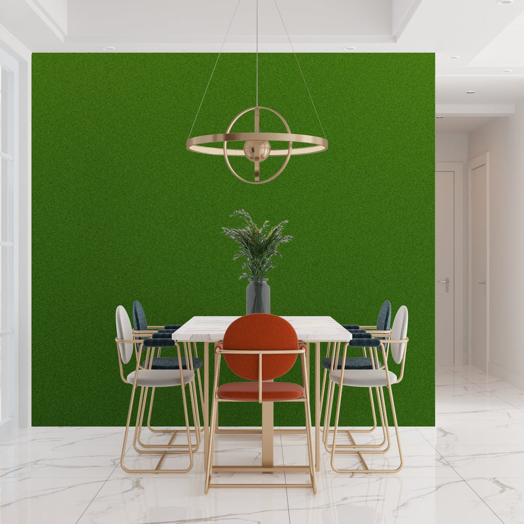 Green statement wall in dining room with modern furniture