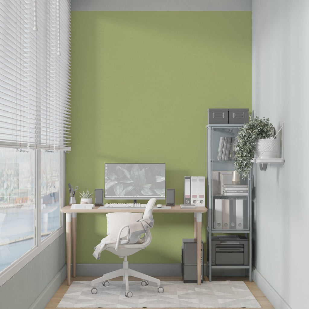 Soft green wall mural bringing calm to a minimalist bedroom setting
