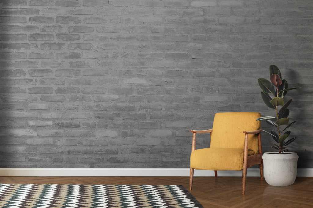 Modern grey brick wall design in bedroom with minimal decor