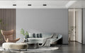 Modern grey textured wallpaper in a minimalist living room setting with natural light