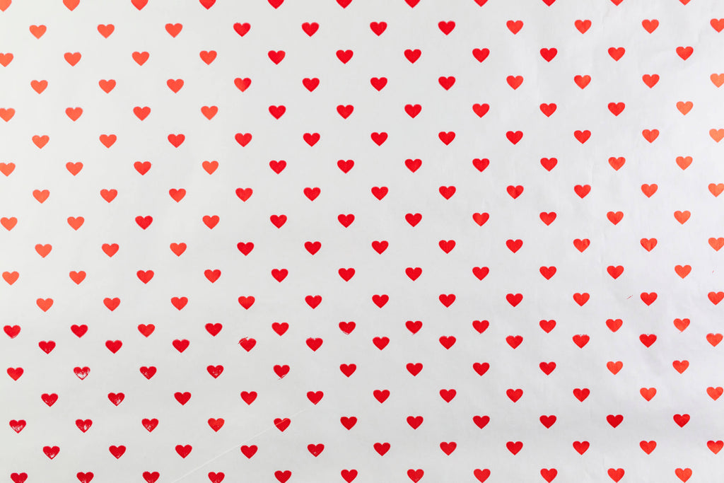 Design file showing red heart pattern on grey background wallpaper