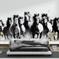 Black and white horse wallpaper mural showcased in a modern living room with minimal furniture and natural light