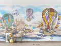 Hot air balloon wallpaper creates a magical atmosphere in a bright nursery with soft natural light