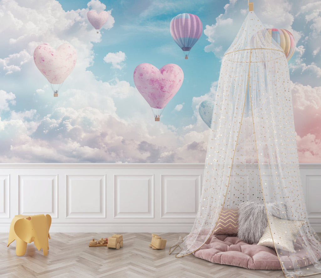 Pink heart balloon mural creating depth in a kids playroom with reading nook