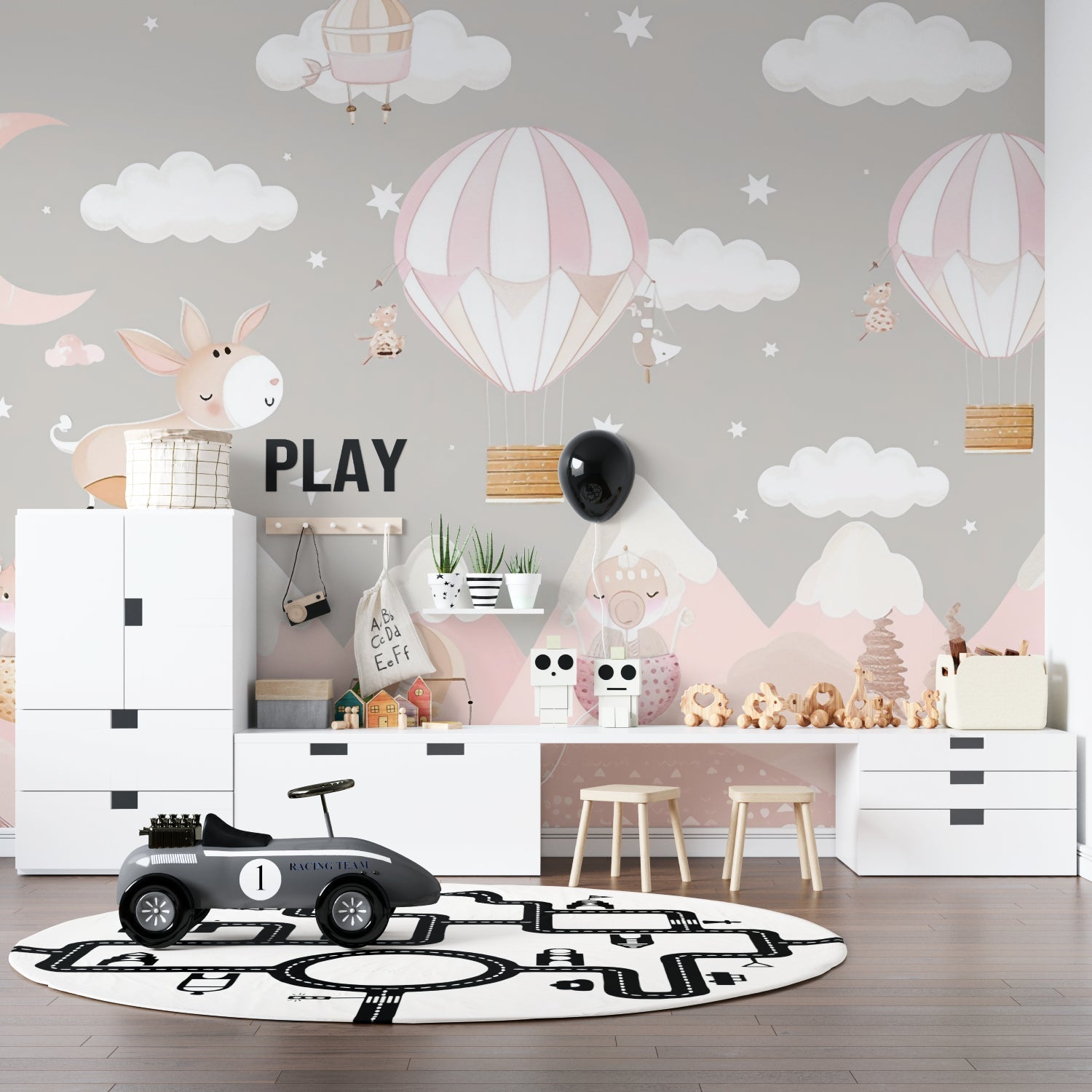 Pink hot air balloon mural creating magic in a modern playroom setting