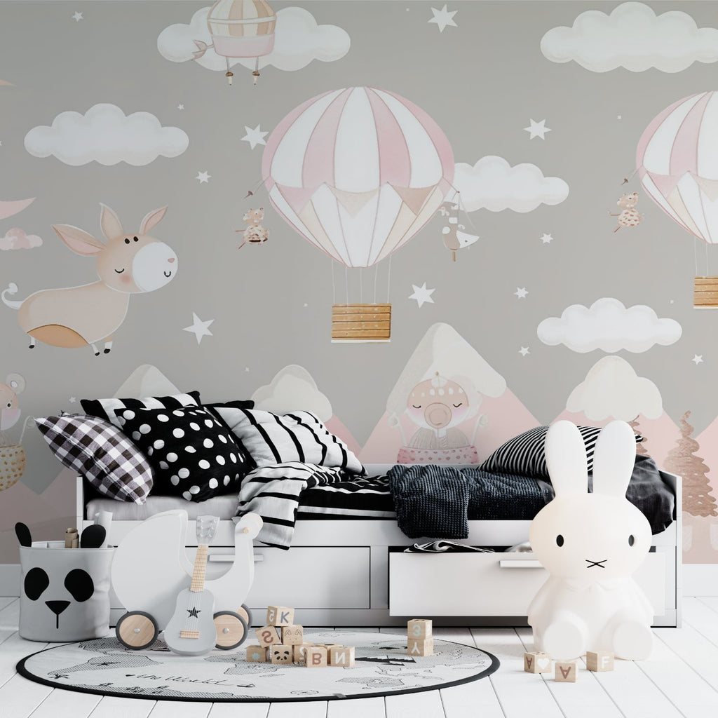 Nursery wall mural with hot air balloons displayed in a reading nook