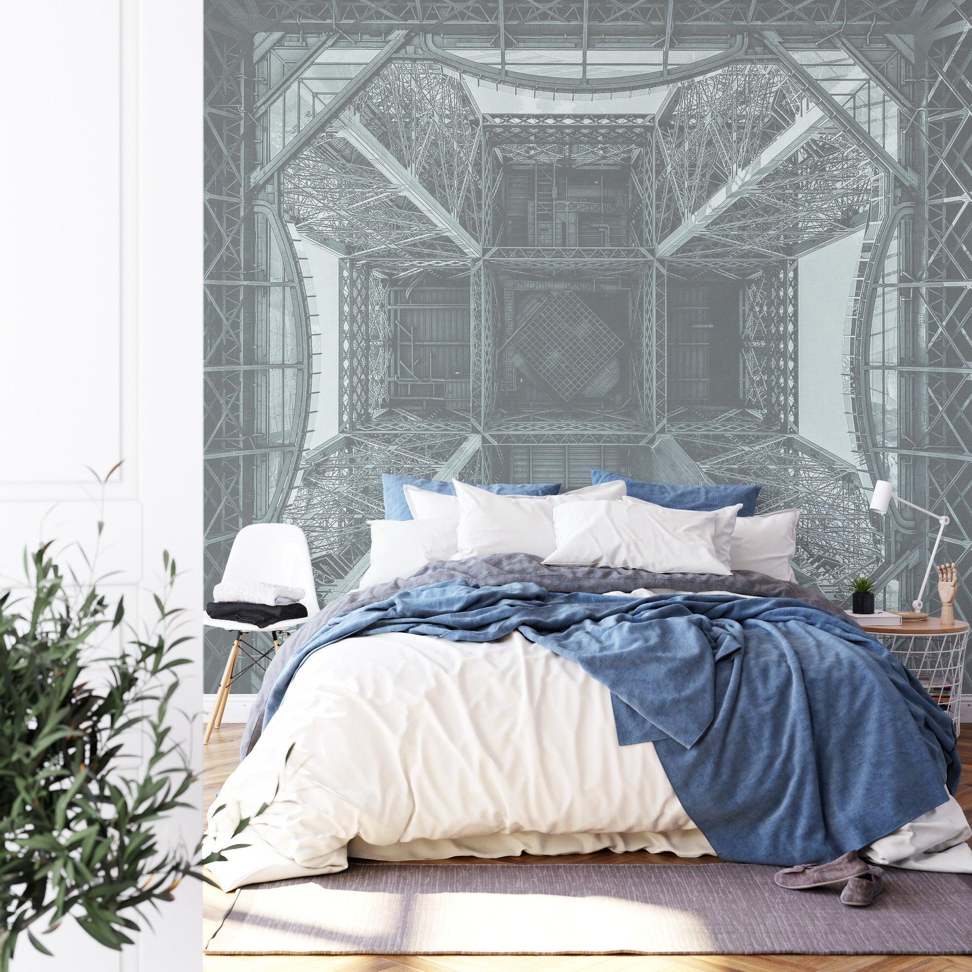 Industrial Eiffel Tower wallpaper creating a dramatic focal point in a modern minimalist living room