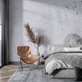 Modern concrete texture wallpaper in minimalist living room showing industrial style and clean lines