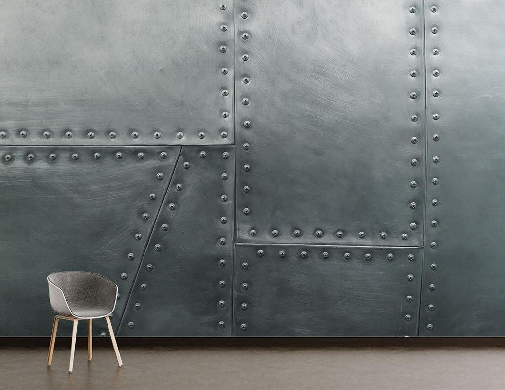 Steel plate wall mural adding urban character to an industrial-style living room with exposed beams