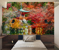 Japanese garden wallpaper in modern living room showing red bridge and autumn maples