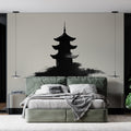 Japanese pagoda wallpaper creating a peaceful atmosphere in a modern living room with minimalist furniture