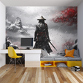 Japanese warrior wallpaper creating dramatic impact in modern living room with gray sofa and minimal decor