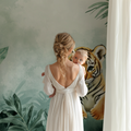 Tiger cub wallpaper creating a cozy atmosphere in a modern nursery with natural wood furniture
