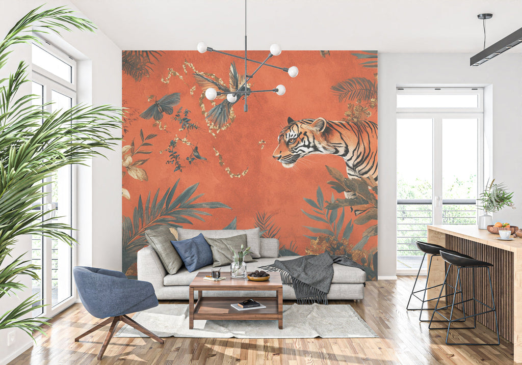 Tropical tiger wallpaper creating a bold statement wall in a modern living room with terracotta accents