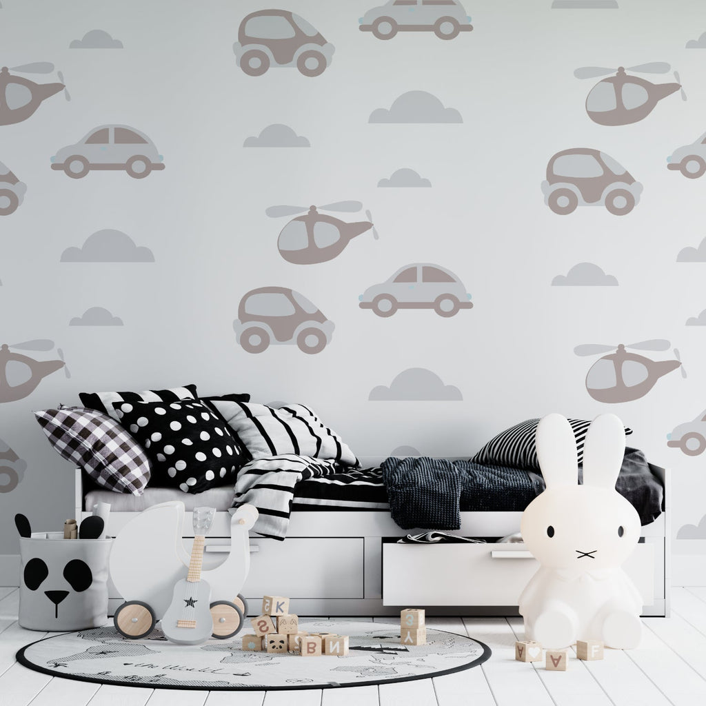 Transport wallpaper in modern nursery with rocking chair and soft lighting showing cars and helicopters pattern