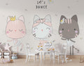 Dancing cats ballet wallpaper in a bright nursery with white furniture