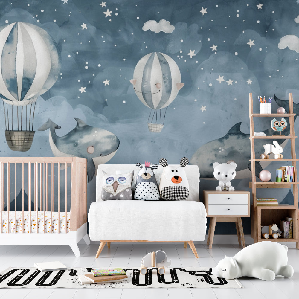 Toddler room with dreamy whale wallpaper mural showing scale and colors
