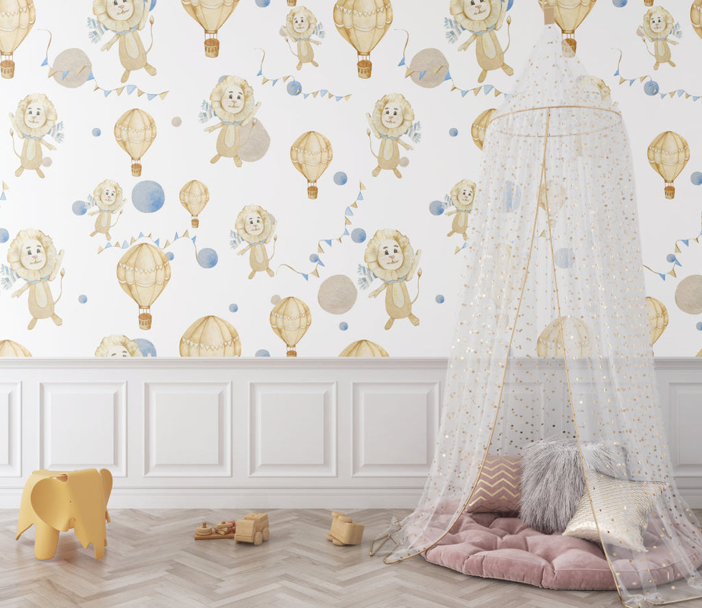 Hot air balloon nursery wallpaper in a bright modern nursery with white furniture