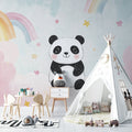 Sweet Panda nursery wallpaper with rainbows displayed in a bright nursery with white furniture