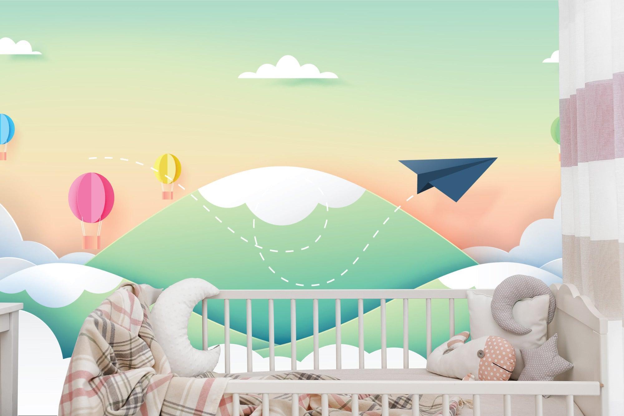 Kids bedroom showcasing adventure wallpaper with paper airplanes and pastel hot air balloons