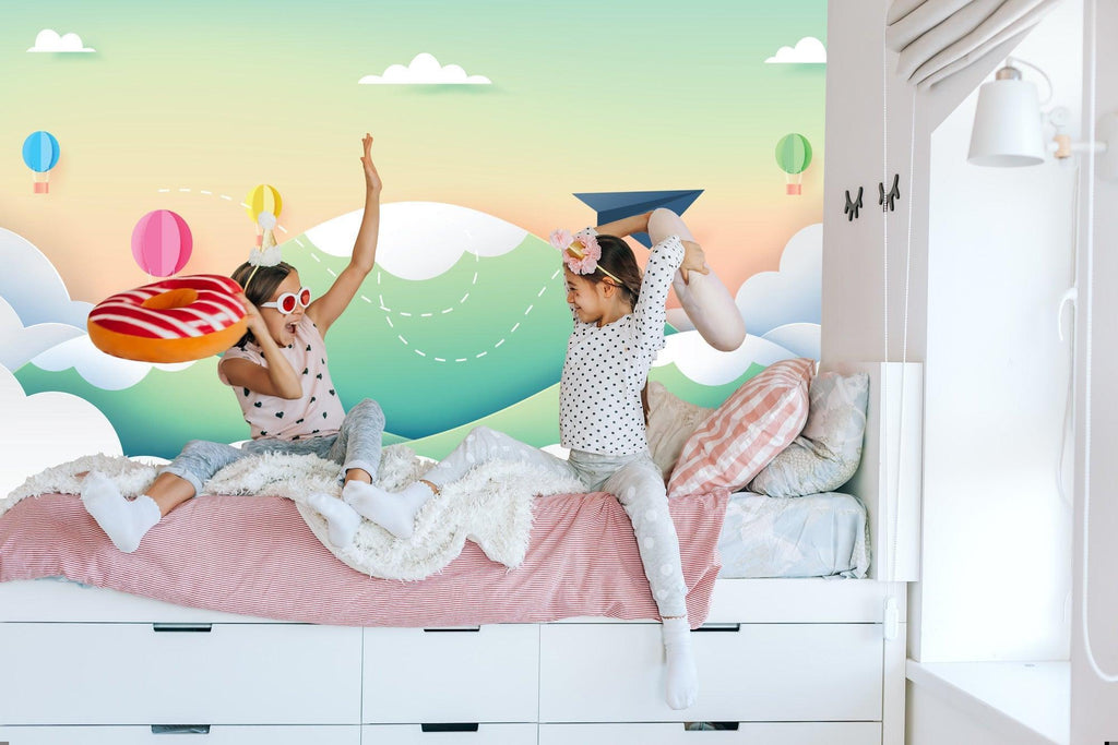 Playroom featuring sky adventure wallpaper with floating balloons and paper airplane design