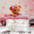 Pink teddy bear wallpaper in a cozy nursery with white furniture and soft lighting