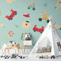 Vintage toy wallpaper creating a cozy atmosphere in a modern nursery with natural light