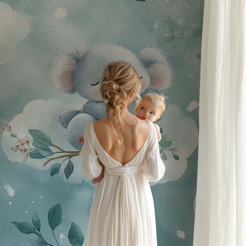 Dreamy koala wallpaper in a gender-neutral nursery with white furniture
