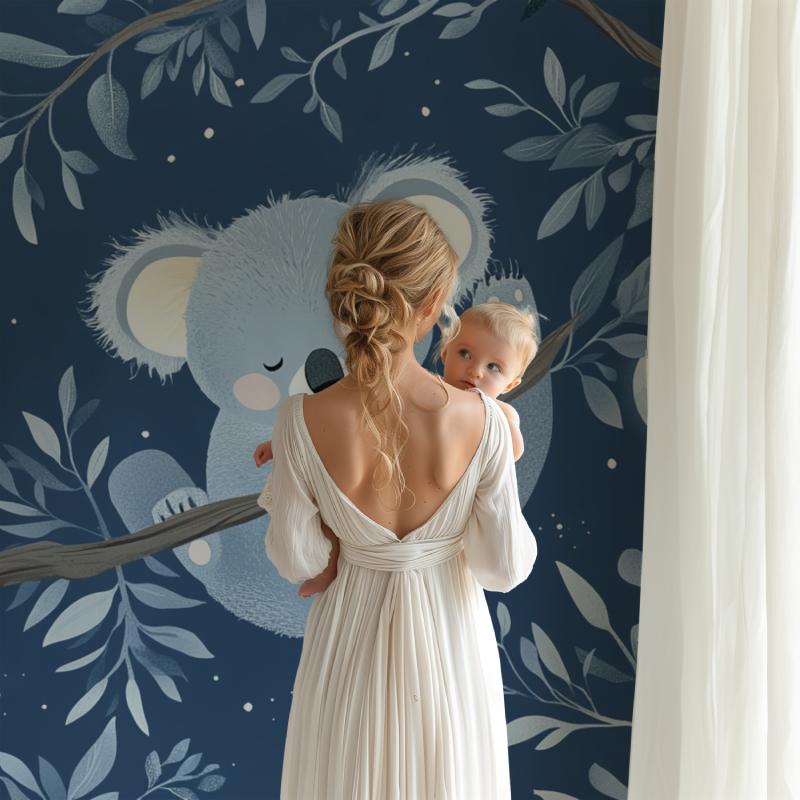 Koala nursery wallpaper creating a peaceful atmosphere in a modern nursery with neutral furniture