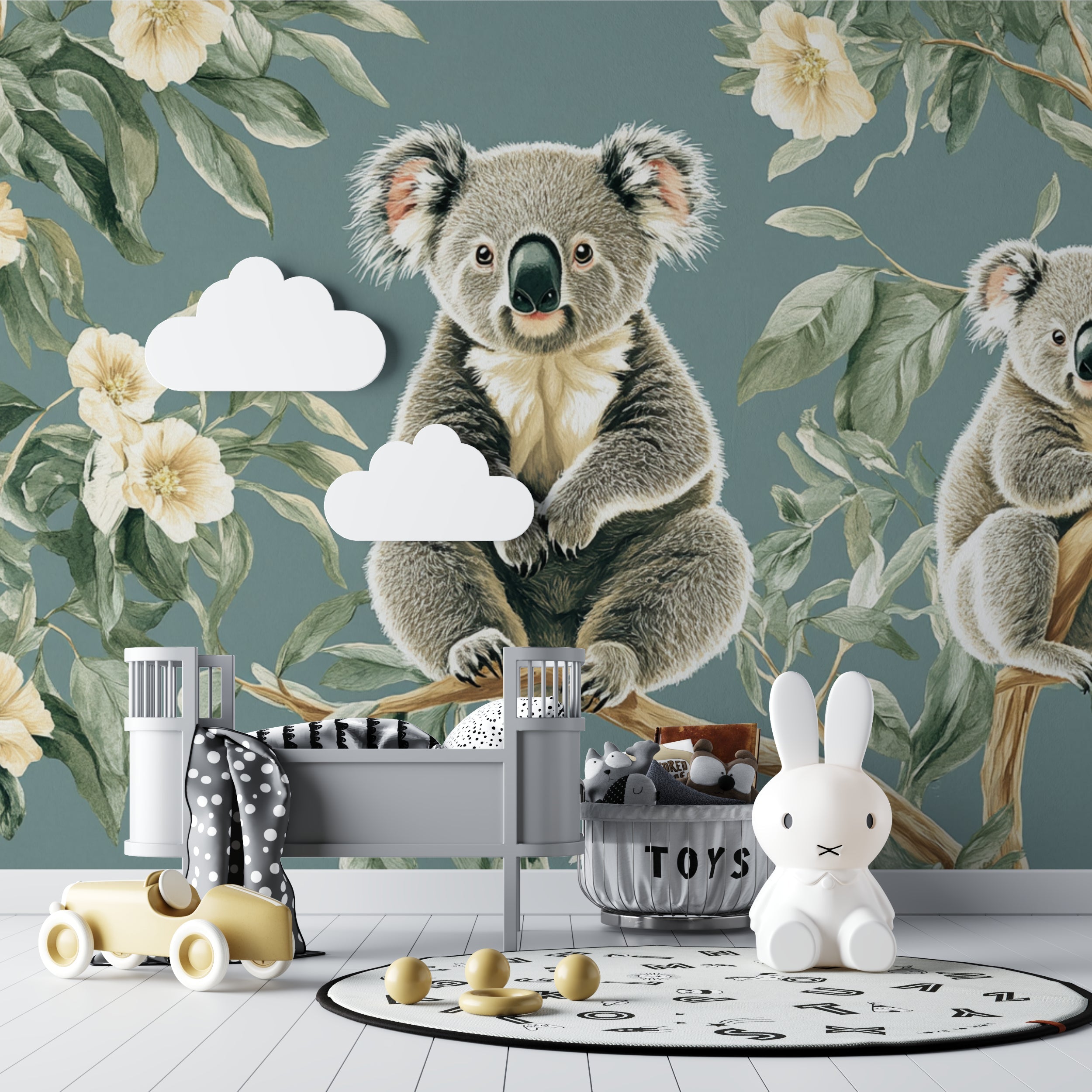 Australian koala wallpaper creating a focal point in a baby's nursery with natural decor