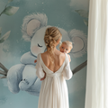Koala wallpaper in a modern nursery with white furniture, creating a peaceful sleep environment