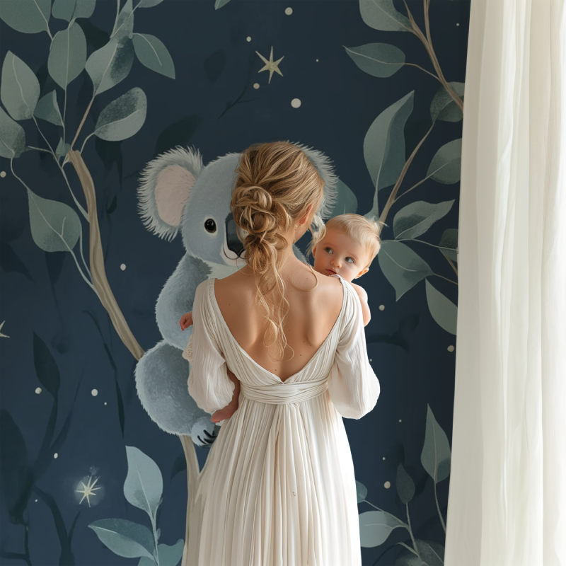 Koala nursery wallpaper creating a peaceful atmosphere in a modern nursery with white furniture