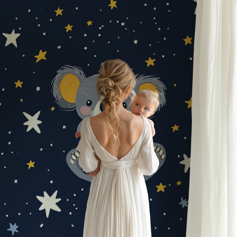 Starry koala wall mural creating a cozy reading nook in a toddler's bedroom