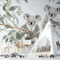 Koala wallpaper mural creating a cozy atmosphere in a modern nursery with natural light