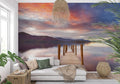 Lake landscape wallpaper creating depth in modern living room with minimal furniture