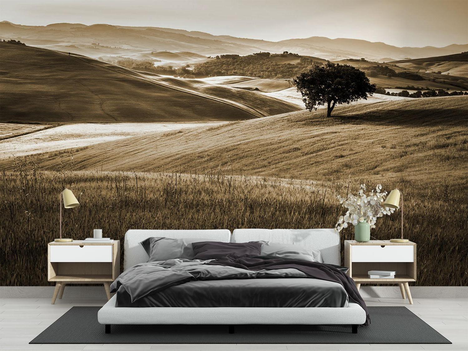 Sepia Tuscan landscape wallpaper in modern living room, creating depth and warmth
