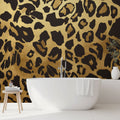 Luxury Black and Gold Leopard Print Wallpaper creating drama in a modern living room with minimal furniture
