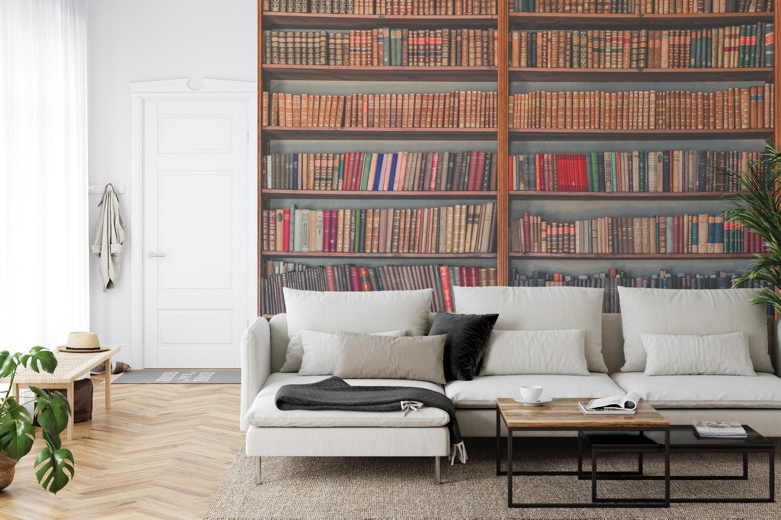 Library wallpaper mural creating a cozy reading nook in a modern living room corner