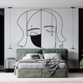 Modern Line Art Face Wallpaper creating dramatic contrast in a minimalist living room setting
