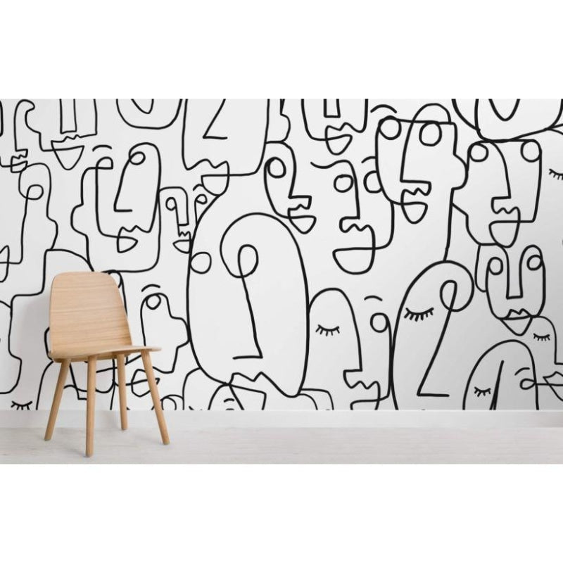 Minimalist face design wallpaper transforming a dining room wall
