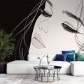 Line art portrait mural wallpaper creating striking contrast in a modern minimalist living room with natural lighting