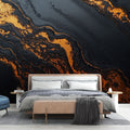 Black and gold marble wallpaper creates dramatic impact in modern living room with clean lines and minimal furniture