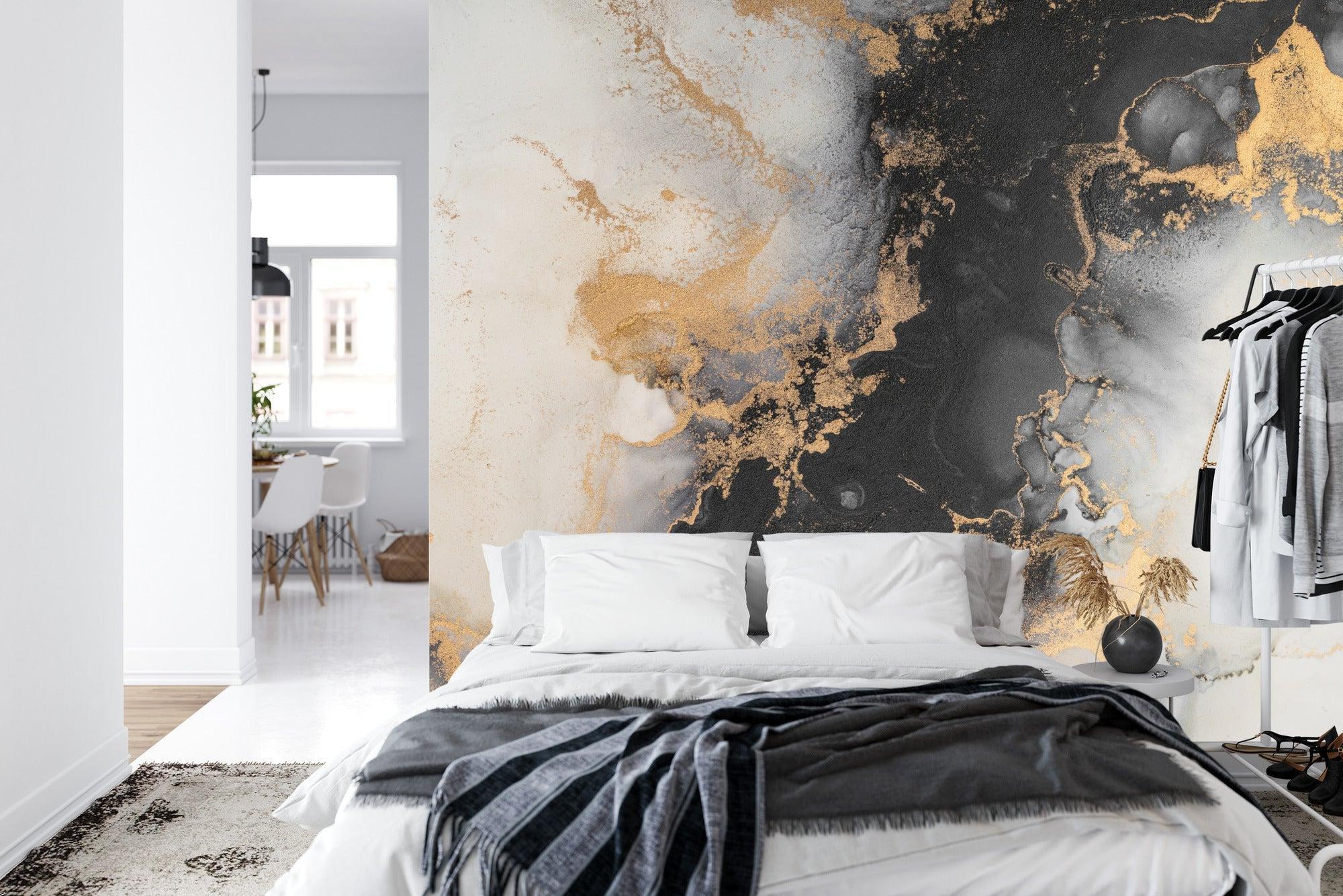Abstract marble design transforming master bedroom with rich black and gold tones