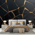 Black and gold marble wallpaper creating dramatic impact in a modern living room with high ceilings and minimalist furniture